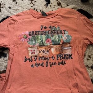 Graphic Cactus Tee in Coral with Potted Plant Design